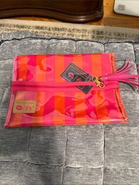 Makeup Junkie Striped Pink & Orange Vinyl Clutch with Tassel